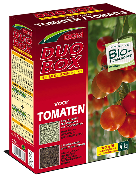 Een rode doos met DCM Duo Box voor tomaten, met afbeeldingen van tomatenplanten en de inhoud: meststof en kalk.